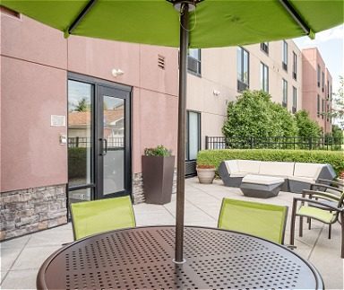 Hotel outdoor area with umbrella tables